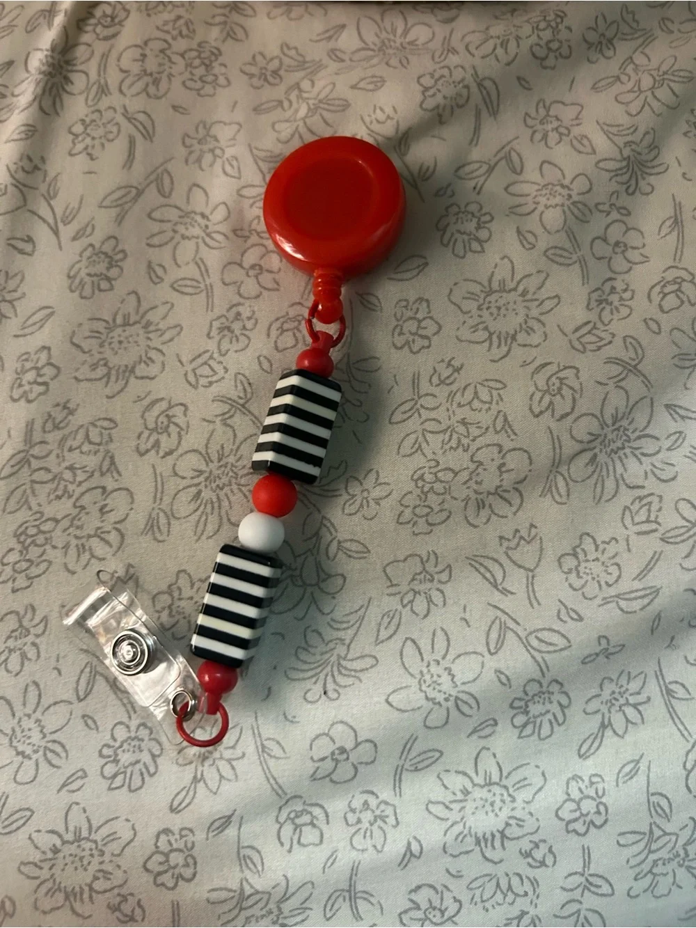 Red Beaded Badge Reel with Black & White Accents